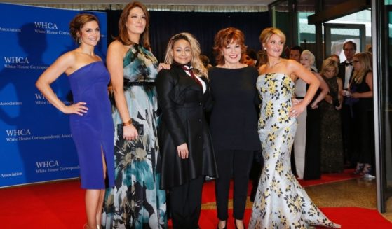 From left, the cast of 'The View' -- Paula Faris, Michelle Collins, Raven Symone, Joy Behar and Candace Cameron Bure -- arrives for the White House Correspondents' Association annual dinner in Washington, D.C., on April 30, 2016.