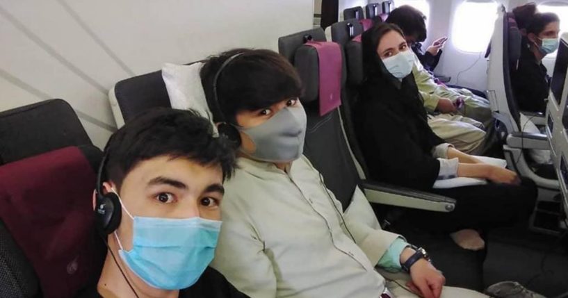 A group of students from the Afghanistan National Institute of Music are seen on their way to Doha, Qatar, on Monday.