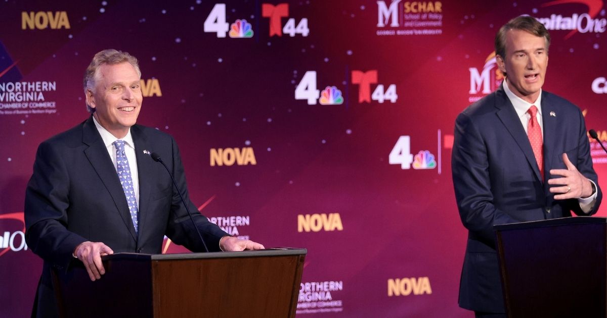 Former Virginia Gov. Terry McAuliffe, left, and Republican gubernatorial candidate Glenn Youngkin, right, debate each other in Alexandria, Virginia, on Sept. 28.
