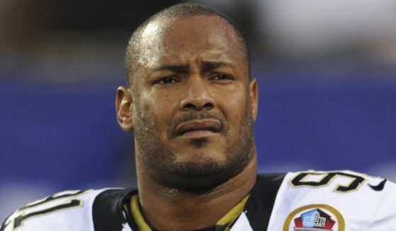 New Orleans Saints defensive end Will Smith looks on during a game against the New York Giants in East Rutherford, New Jersey, on Dec. 9, 2012.