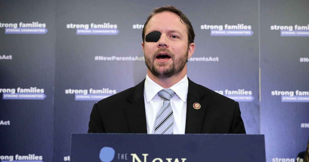 Texas Rep. Dan Crenshaw speaks during a news conference in the Russell Senate Office Building on Capitol Hill on March 27, 2019, in Washington, D.C.