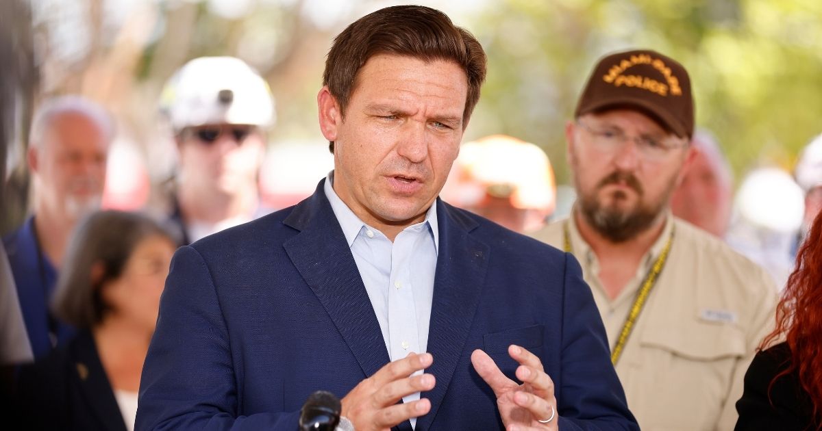 Florida Gov. Ron DeSantis speaks to the media about the 12-story Champlain Towers South condo building that partially collapsed on July 03, in Surfside, Florida.