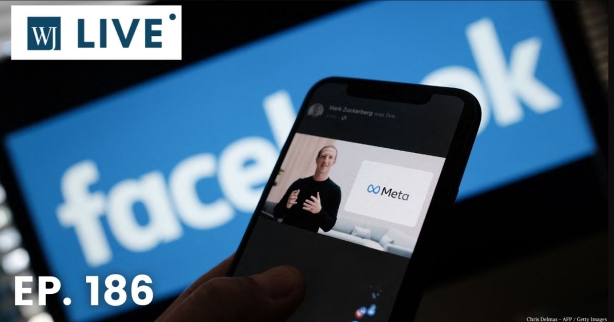 In this illustration photo taken in Los Angeles on Thursday, a person watches on a smartphone Facebook CEO Mark Zuckerberg unveil the META logo.