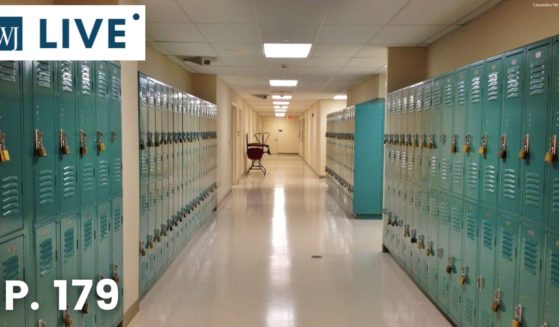 Blue lockers in a school hallway