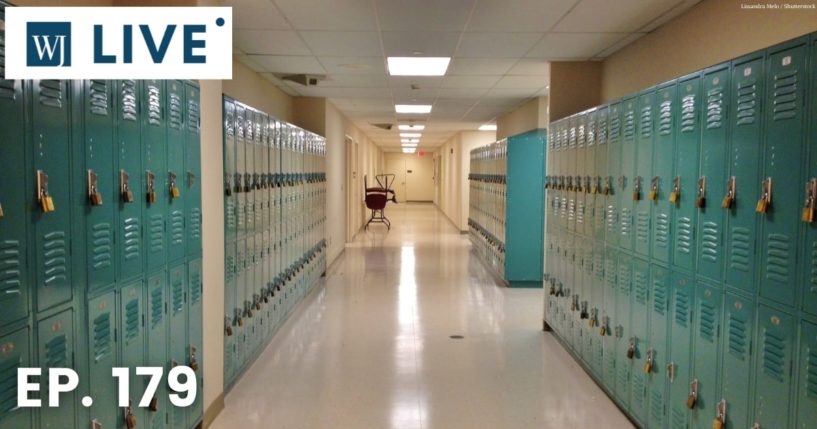 Blue lockers in a school hallway