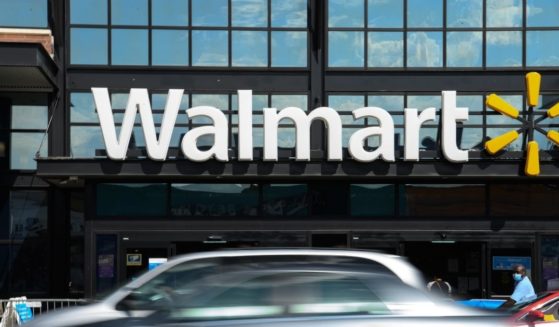 Cars drive past a Walmart store in Washington, D.C., on Aug. 18, 2020.