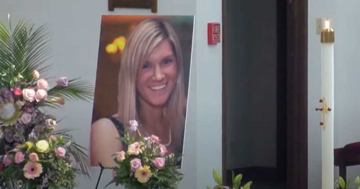 A photo of Jessica Wilson is displayed during her funeral.