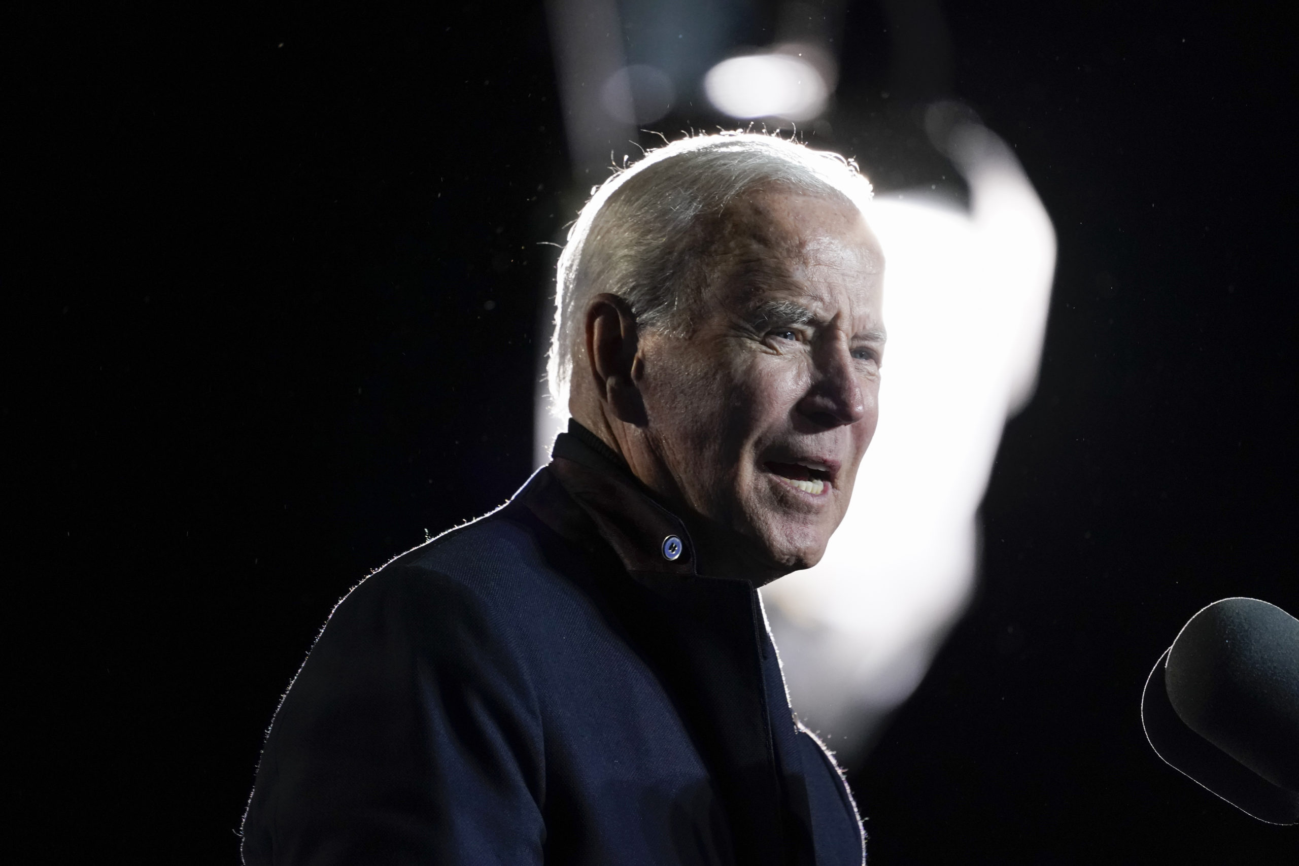 In this Oct. 26, 2021, file photo President Joe Biden speaks at a rally for Democratic gubernatorial candidate, former Virginia Gov. Terry McAuliffe, Tuesday, Oct. 26, 2021, in Arlington, Va. As Biden and Democrats try to get a roughly $2 trillion package over the finish line, a new poll shows that Biden faces an increasingly pessimistic nation and an underwater approval rating on his handling of the nation’s economy.