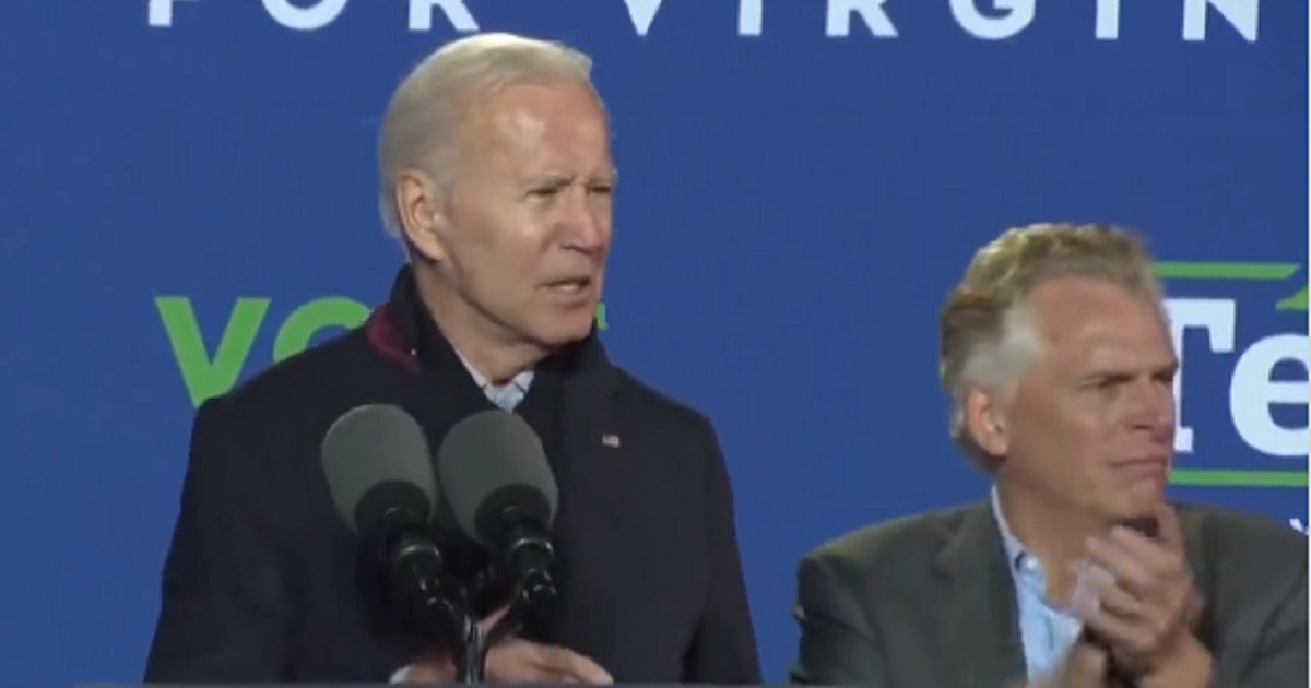 President Joe Biden stumps in Virginia for Democratic gubernatorial candidate Terry McAuliffe, right..