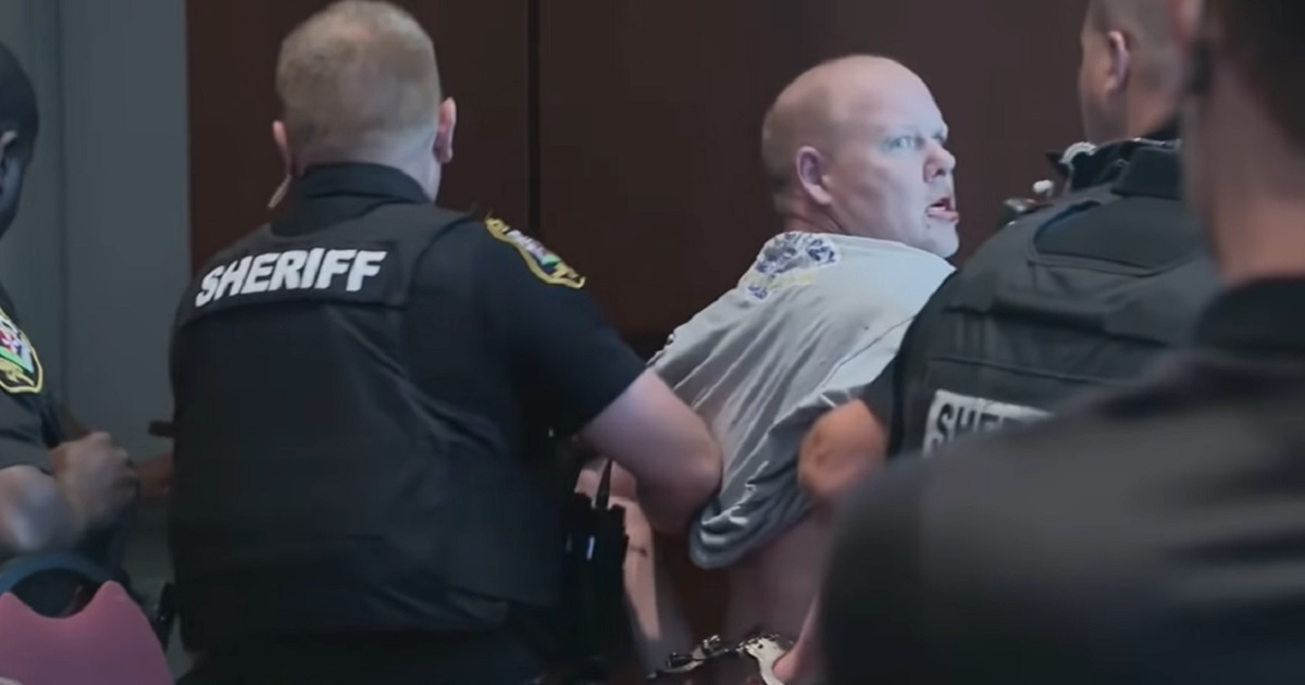 Loudoun County, Virginia, resident Scott Smith is arrested after an altercation at a county school board meeting in June.