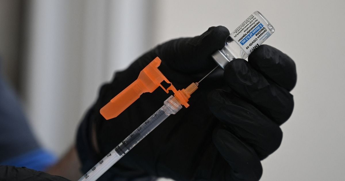 A nurse fills a syringe with Johnson & Johnson's COVID-19 vaccine at a clinic in Pasadena, California, on Aug. 19, 2021.