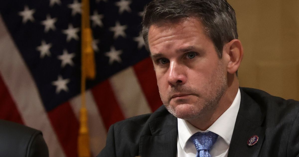 Rep. Adam Kinzinger listens during a committee meeting on Capitol Hill on Oct. 19 in Washington, D.C.