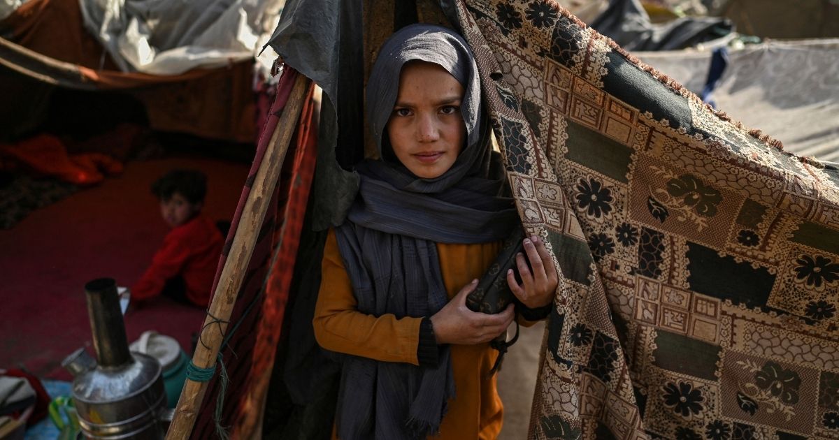 An internally displaced Afghan girl is pictured in the Saray Shamali refugee camp in Kabul on Nov. 2.