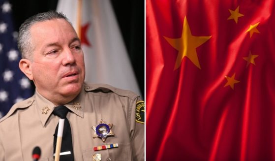 Los Angeles County Sheriff Alex Villanueva speaks at a news conference on Nov. 2 in downtown Los Angeles. The Chinese flag is seen in the stock image on the right.