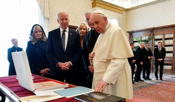 Pope Francis exchanges gifts with President Joe Biden and and First lady Jill Biden at the Apostolic Palace on Friday in Vatican City, Vatican.