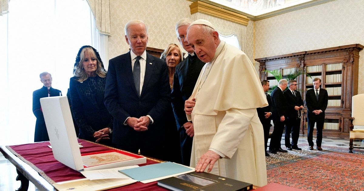 Pope Francis exchanges gifts with President Joe Biden and and First lady Jill Biden at the Apostolic Palace on Friday in Vatican City, Vatican.