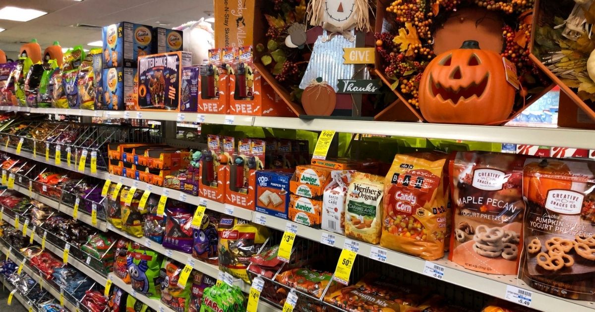 A store in Freeport, Maine has an aisle of Halloween candy and fall decorations displayed.