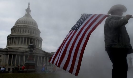Protesters hold a rally outside the U.S. Capitol in Washington, D.C., on Jan. 6.