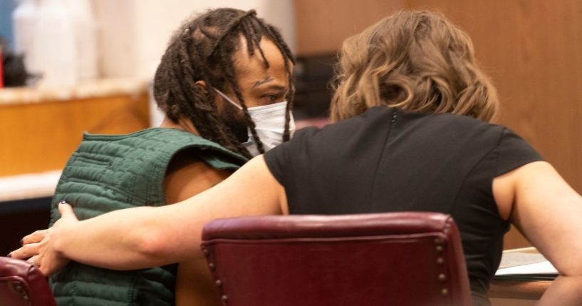 Darrell Brooks, accused of killing six people and injuring dozens of others by driving through a Christmas parade, appears in Waukesha County Court in Waukesha, Wisconsin, on Tuesday.