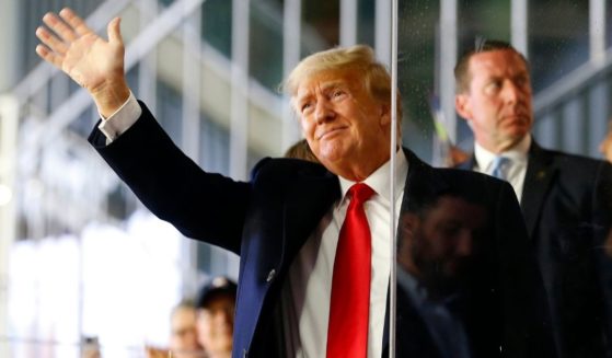 Former President Donald Trump waves prior to Game Four of the World Series between the Houston Astros and the Atlanta Braves Truist Park on Oct. 30 in Atlanta, Georgia.