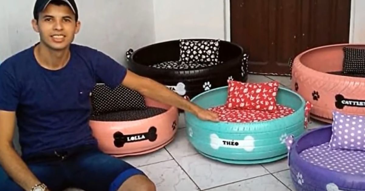Amarildo Silva Filho of Brazil shows off some of his dog beds made from tires.