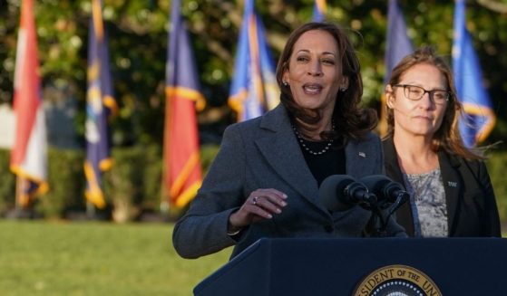 Vice President Kamala Harris speaks as Heather Kurtenbach looks on during a signing ceremony for the Infrastructure Investment and Jobs Act on the South Lawn of the White House in Washington, D.C., on Monday.