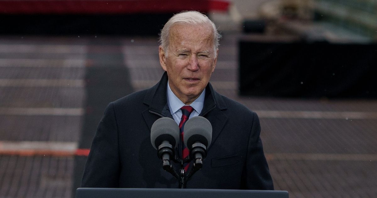 President Joe Biden delivers a speech on infrastructure while visiting the NH 175 bridge spanning the Pemigewasset River in Woodstock, New Hampshire, on Tuesday.