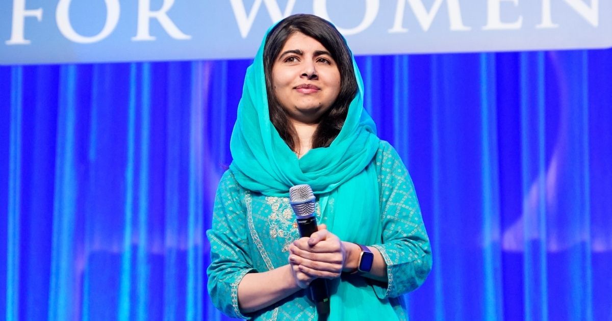 Malala Yousafzai speaks on stage at the Massachusetts Conference for Women at the Boston Convention Center on Dec. 12, 2019.