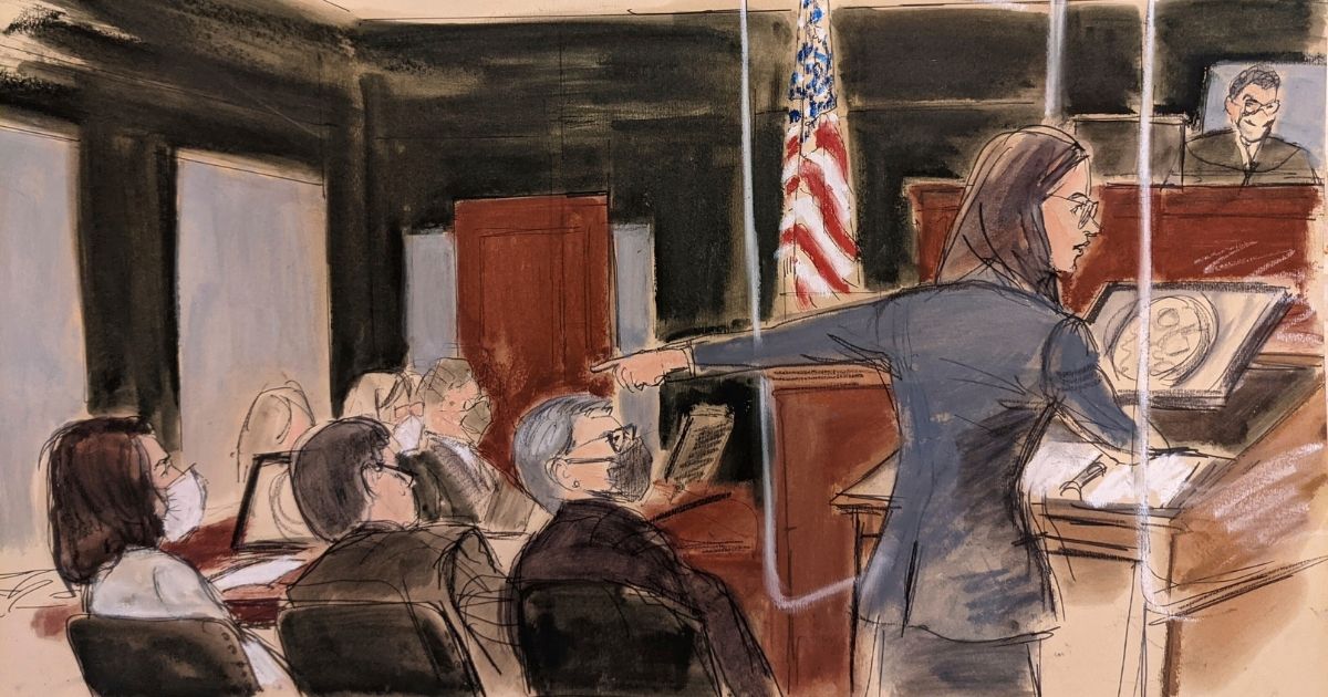A courtroom sketch shows Assistant U.S. Attorney Lara Pomerantz giving her opening statement while pointing to Ghislaine Maxwell, seated far left, in Manhattan federal court in New York on Monday.