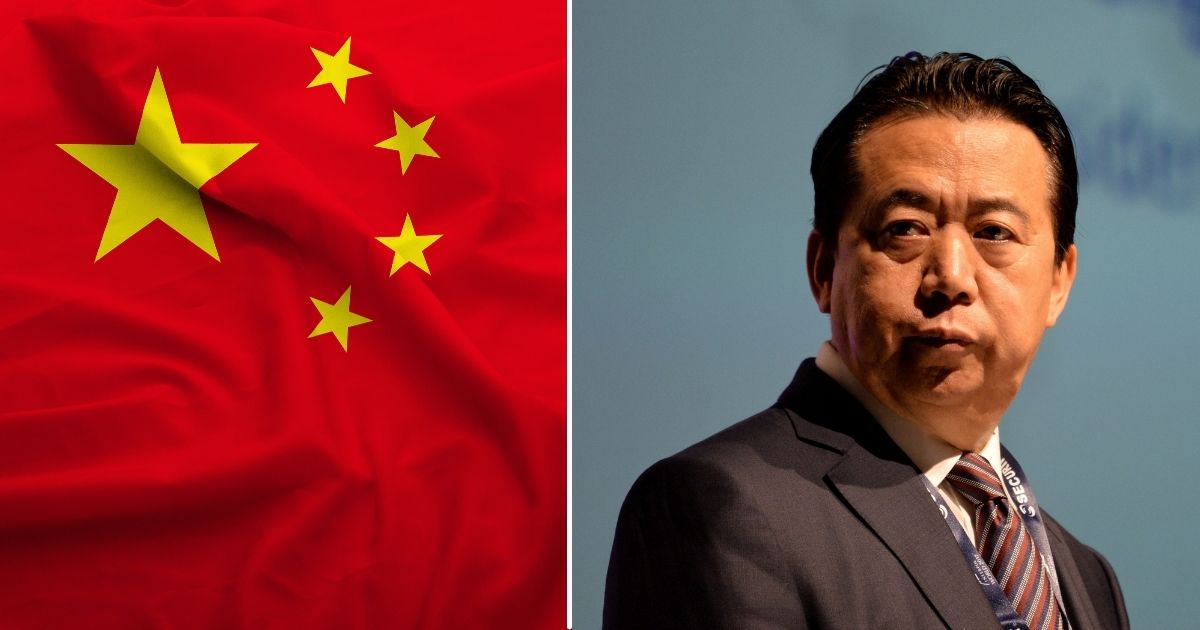 The Chinese flag is seen in the stock image on the left. Meng Hongwei, president of Interpol, gives an address at the opening of the Interpol World Congress in Singapore on July 4, 2017.