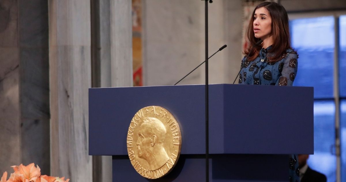 Iraqi Yazidi-Kurdish human rights activist and co-laureate of the 2018 Nobel Peace Prize Nadia Murad is seen accepting her prize during the Nobel Peace Prize ceremony in December 2018. A Toronto school board has withdrawn its students from participation in a book club event over fears of offending Muslims by spotlighting Murad's autobiographical account of her experiences as an ISIS sex slave.