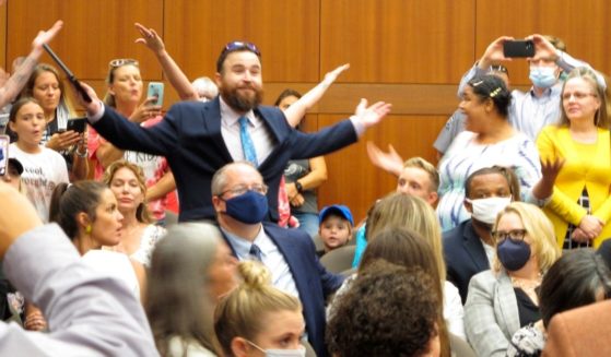 A large group of parents in Baton Rouge, Louisiana, attended a school board meeting on Aug. 18 to protest Gov. John Bel Edwards' school mask mandate.