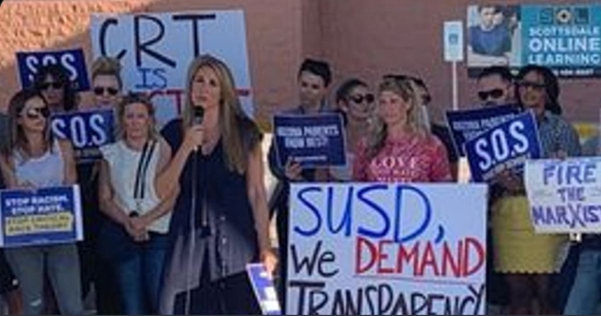 Parents in Scottsdale, Arizona, protest the teaching of Critical Race Theory outside of a school board meeting.