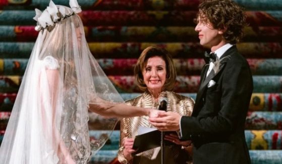 California Rep. Nancy Pelosi, center, officiated over the weekend at the wedding of Ivy Getty, great-granddaughter of billionaire oil tycoon J. Paul Getty, to Tobias Engel.
