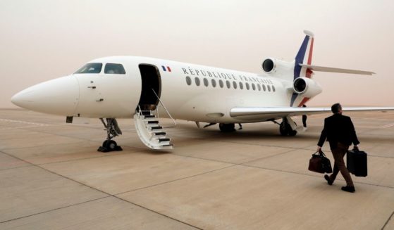 A picture taken on Jan. 27, 2019, shows the French Presidential's Dassault Falcon 7X plane, arriving on the tarmac of Abu Simbel airport, south of Aswan in upper Egypt.