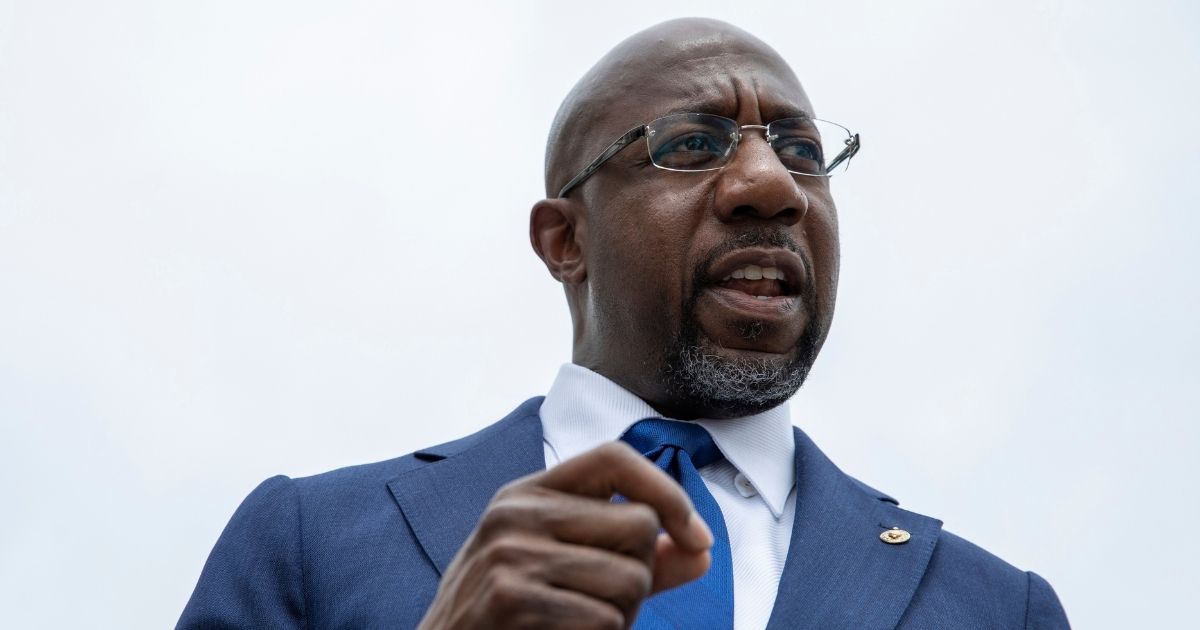 Sen. Raphael Warnock, a Democrat representing Georgia, speaks out about voting rights legislation on Capitol Hill on Aug. 3.