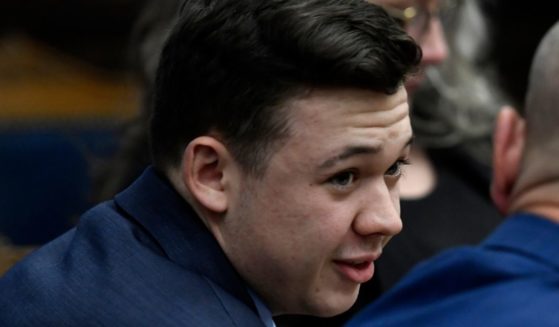 Kyle Rittenhouse, seen during his trial earlier this month, has been encouraged to consider suing President Joe Biden over a Twitter post imlying the teen was a white supremacist.