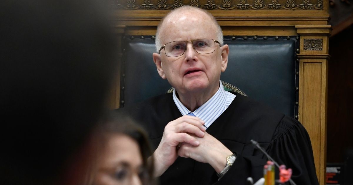 Judge Bruce Schroeder speaks to the attorneys about how the jury will view evidence as they deliberate during Kyle Rittenhouse's trial at the Kenosha County Courthouse on Wednesday in Kenosha, Wisconsin.