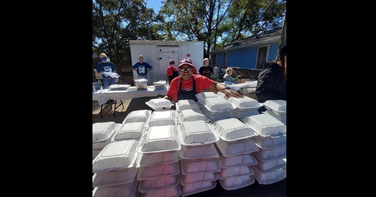 Pensacola Pastor Sylvia Tisdale of Epps Christian Center helps package food to give to the community in Pensacola, Florida.