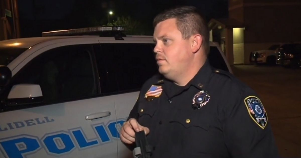 Officer Darren Marcev of the Slidell Police Department in Louisiana is credited with saving a man's life after a train ran over him.