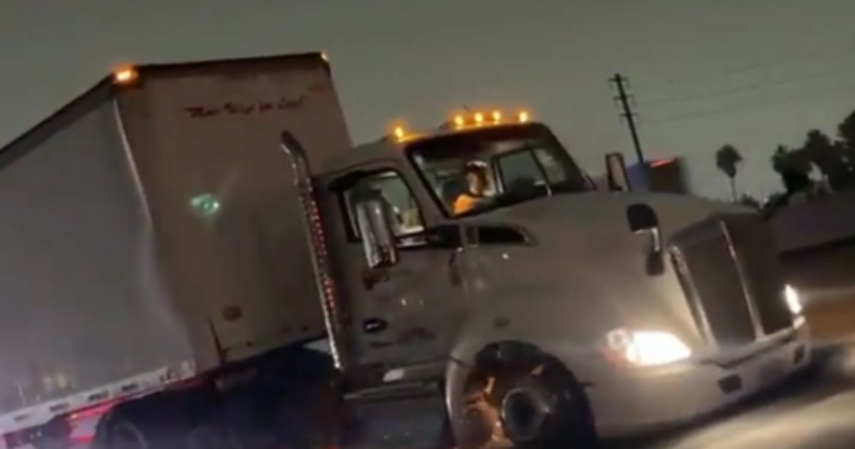 Big Rig drivers passes cars on the Los Angeles highway while being chased by police early Thursday morning.