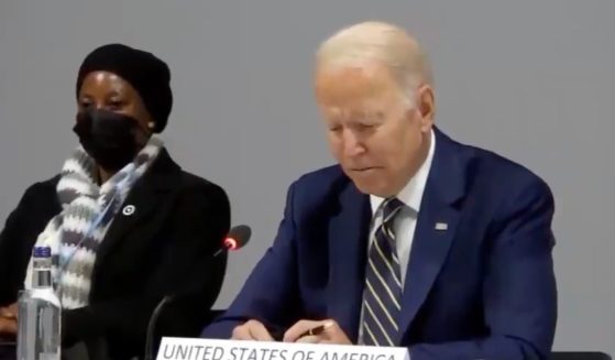 President Joe Biden speaks at COP26 in Scotland on Monday.