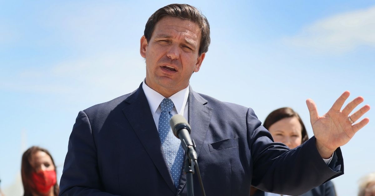 Florida Republican Gov. Ron DeSantis speaks to the media about the cruise industry during a press conference at PortMiami on April 08, in Miami, Florida.