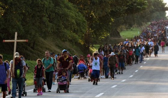 Migrants heading in a caravan to the U.S., walk towards Mexico City to request asylum and refugee status in Mapastepec, Chiapas State, Mexico, on Nov. 1.