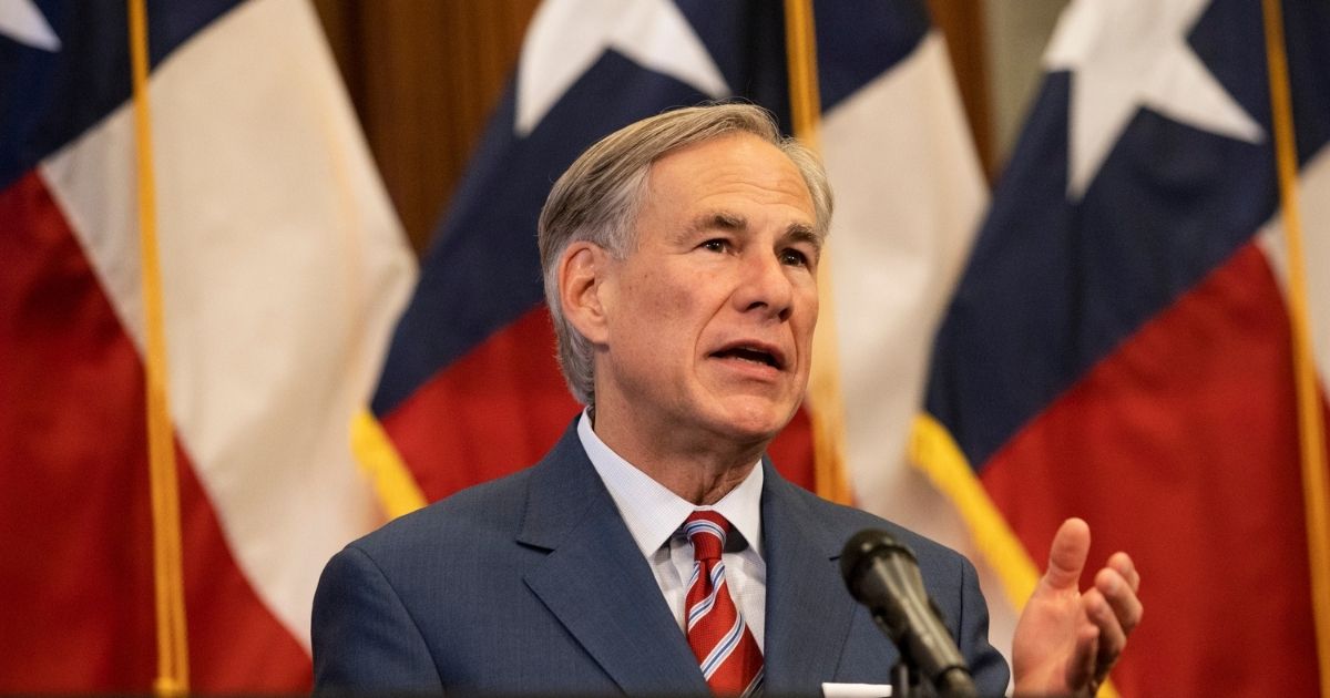 Texas Gov. Greg Abbott announces the reopening of more Texas businesses during the COVID-19 pandemic at a news conference at the Texas State Capitol in Austin on May 18, 2020.