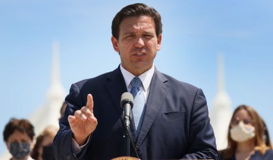 Florida Gov. Ron DeSantis speaks to the media about the cruise industry during a press conference at PortMiami on April 08, in Miami, Florida.