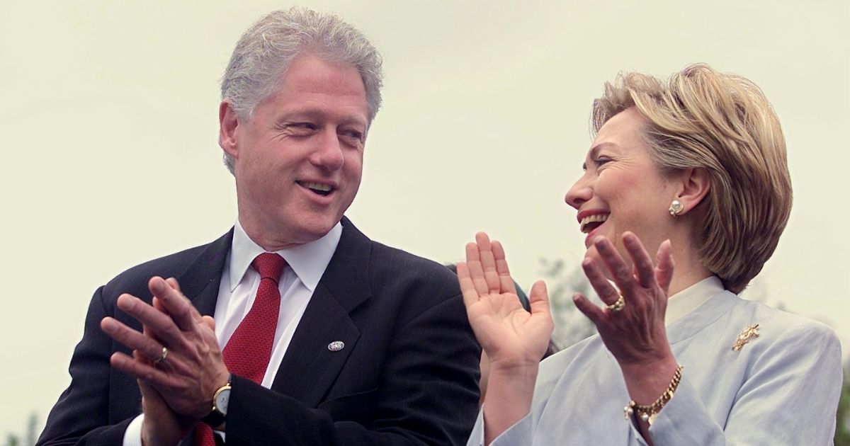 Then-President Bill Clinton and First Lady Hillary Clinton celebrate the 10th anniversary of the Americans with Disabilities Act at the Franklin Delano Roosevelt Memorial in Washington, D.C., on July 26, 2000.