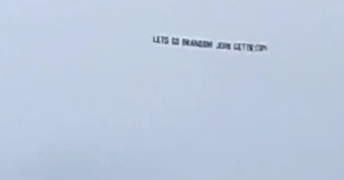 A 'Let's Go Brandon' banner is seen in the sky above the Georgia-Missouri football game on Nov. 6, 2021.