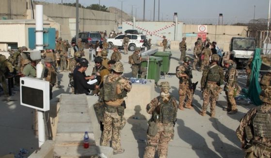 U.S and British military forces evacuate civilians and their families from Kabul, Afghanistan, on Aug. 21, 2021. Many service members and veterans have been dealing with shock and anger over the troop withdrawal from the country.