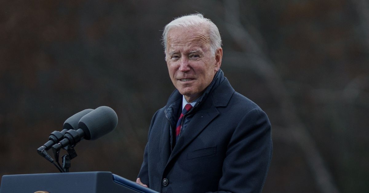 President Joe Biden delivers a speech Tuesday in Woodstock, New Hampshire, where he claimed that his Delaware home once burned down "with my wife in it." It didn't.